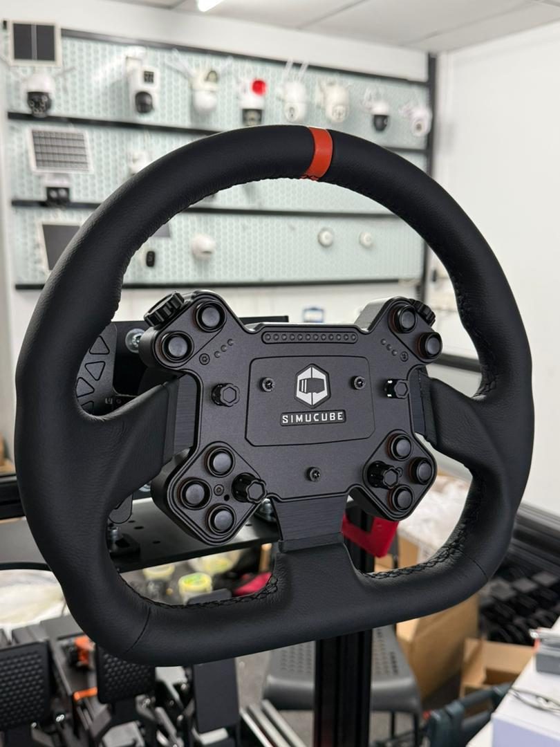 Simucube direct-drive steering wheel mounted on a Vertex-built bespoke rig