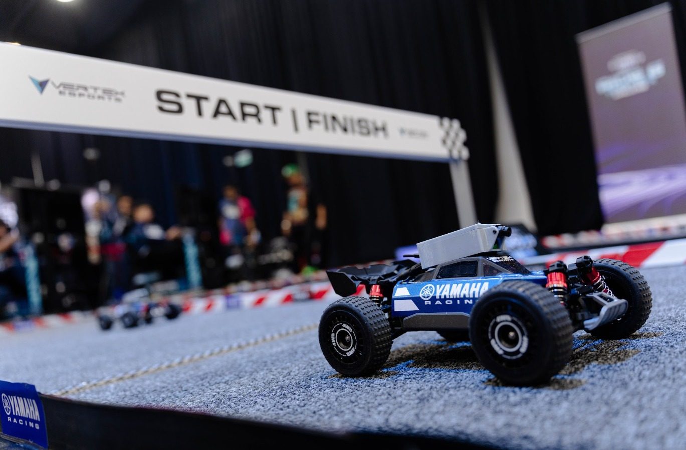 VRC Start/Finish gantry over a live RC racing track built by Vertex for Yamaha's Karnival Gen Blu